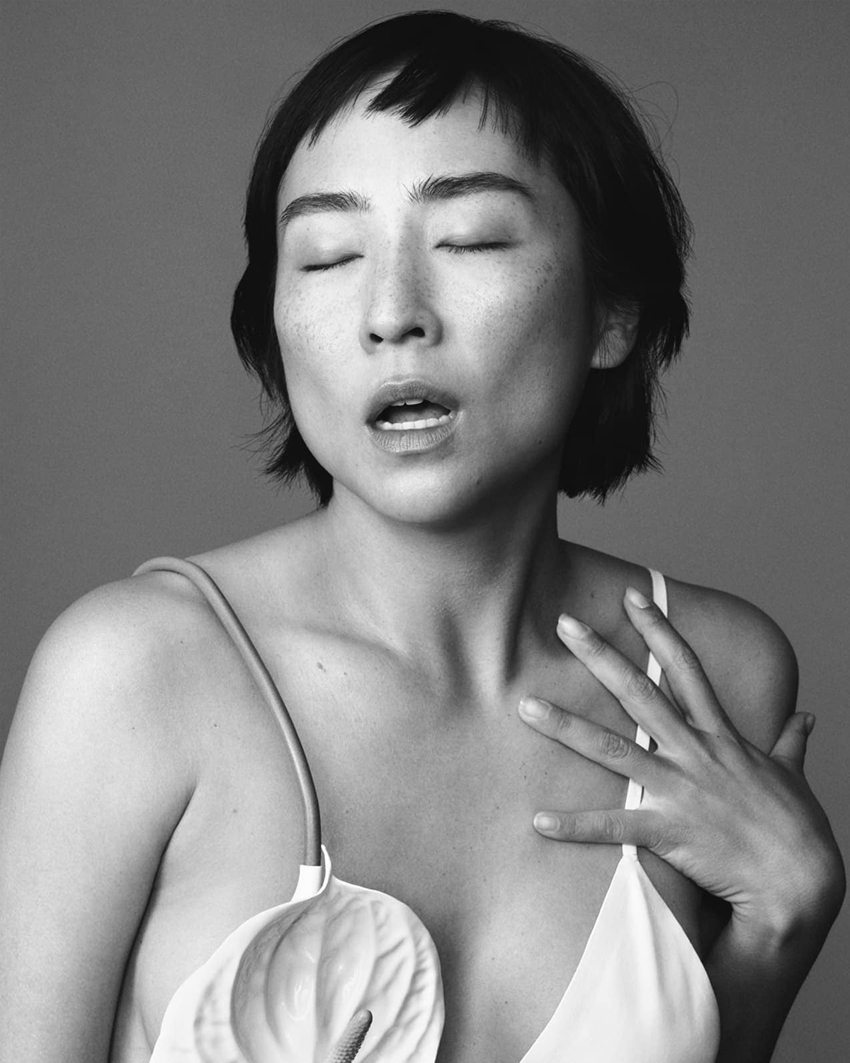 Greta Lee for Loewe's Botanical Rainbow Campaign